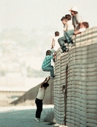Mexicans jumping border fence