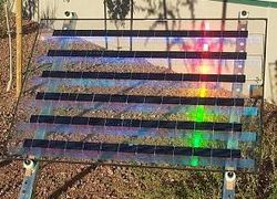 Holographic solar panel from prism