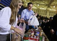 Romney_handing_out_food-bag