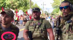 White supremacists with military insignia