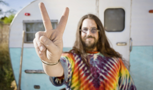 Man-in-tie-dye-shirt-peace-sign