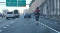 Man on bird scooter.jpg